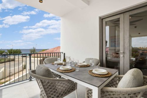 Bonaire Beach Apartments 6 with a refreshing shared pool and ocean view